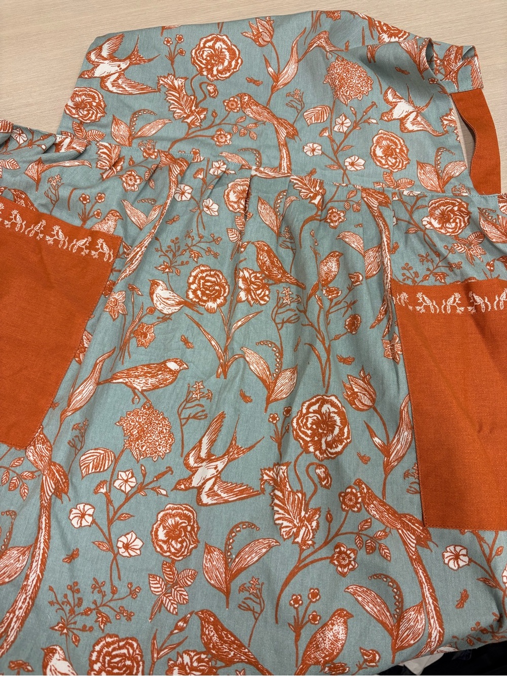World Market Apron Light Blue and Orange Floral Bird Apron with Pockets - Picture 5 of 10